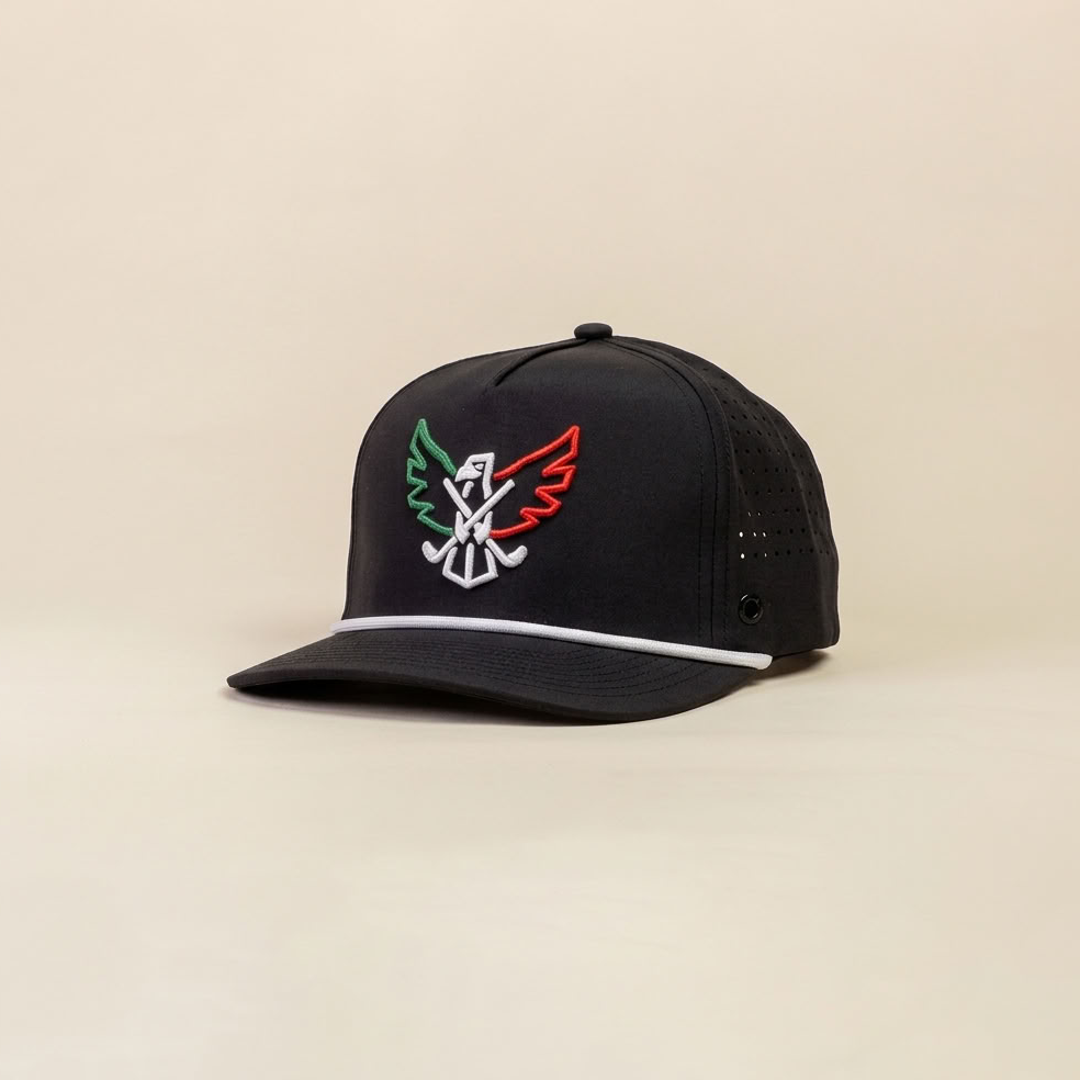 A black structured trucker-style cap with a curved brim, featuring a colorful embroidered logo on the front panel with green, white, red, and black details, set against a solid beige background.